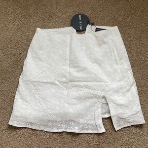 Brand New White Fox Skirt, size Small. With tags. Lining inside skirt.